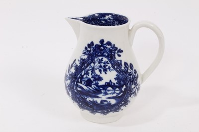 Lot 3 - A Worcester blue and white sparrow beak jug, circa 1780, decorated with European landscapes scenes in shaped panels, 9cm high