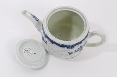 Lot 23 - A Worcester barrel-shaped teapot, circa 1775, relief-moulded and painted with floral patterns, ex-Zoresnky collection, 9.5cm high