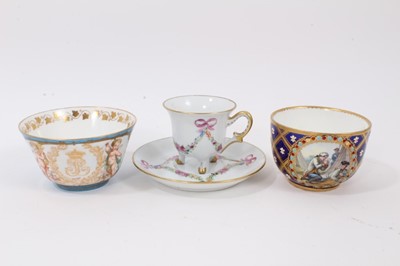 Lot 29 - A Sèvres porcelain bowl, 1758-9, painted with a scene of two soldiers playing cards, inside a circular panel with jewelled border, on a blue ground with moulded fleur-de-lys pattern, a panel to rev...
