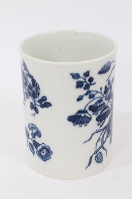 Lot 54 - A Caughley blue and white mug, printed with floral sprays, C mark to base, 8.5cm high
