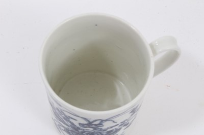 Lot 54 - A Caughley blue and white mug, printed with floral sprays, C mark to base, 8.5cm high