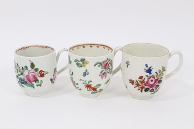 Lot 58 - A Liverpool Christian coffee cup, circa 1775, polychrome painted with floral sprays, together with two similar Worcester coffee cups (3)