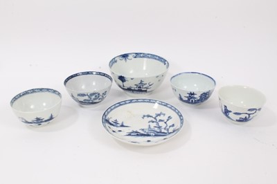 Lot 66 - A Worcester blue and white tea bowl and saucer, circa 1770, painted wih the Cannonball pattern, together with two similar tea bowls and bowl, and a tea bowl painted with Chinese figures (6)