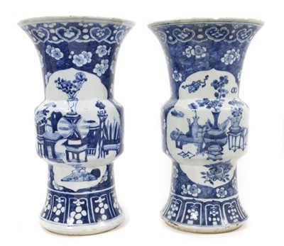 Lot 106 - Pair of 19th century Chinese blue and white Gu vases, one significantly damaged