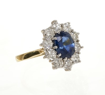 Lot 452 - Sapphire and diamond cluster ring