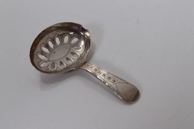Lot 24 - George III silver caddy/sifter spoon with brite cut engraved decoration, (Birmingham 1821), marker IT, 7.2cm long, (0.2oz)