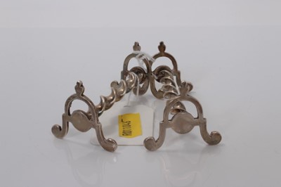 Lot 27 - Pair Victorian silver knife rests, (Chester 1899), maker James Deakin & Sons, 6.5cm long, (2.6oz)