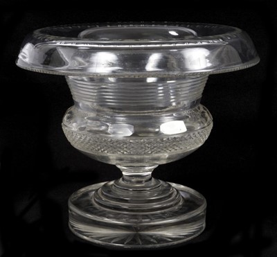 Lot 107 - A Regency cut glass pedestal bowl, with a folded rim, on a stepped circular base, 24cm high