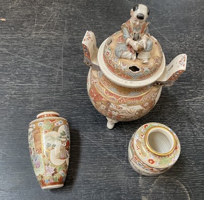 Lot 135 - Pair of Japanese satsuma vases and a satsuma koro and cover