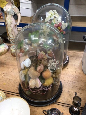 Lot 40 - Two antique glass domes on wooden bases, with fruit and flower displays inside