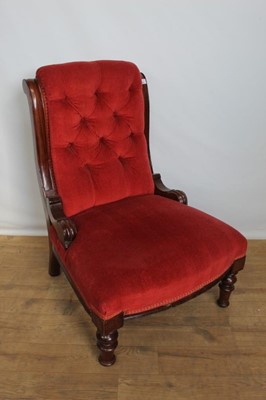 Lot 1129 - Late Victorian mahogany framed nursing chair with red buttoned back upholstery, on turned front legs