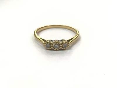 Lot 931 - 18ct gold diamond three stone ring