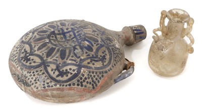 Lot 131 - Roman glass vase and a pottery flask