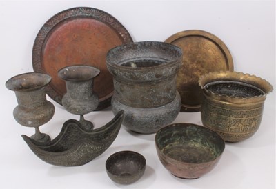 Lot 811 - Good group of Indian and Middle Eastern metalwares, circa 19th century, including vases and bowls, with engraved and relief-form decoration