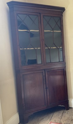 Lot 1287 - George III oak two height corner cabinet.