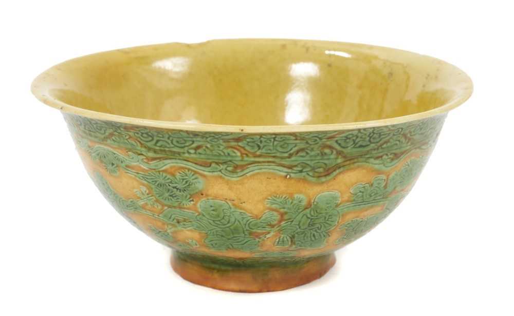 Lot 151 - A fine Chinese yellow and green glazed and incised bowl, Jiajing