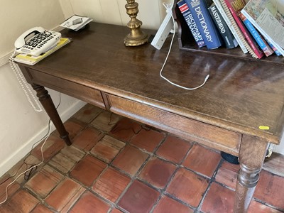 Lot 1295 - Edwardian oak hall table.
