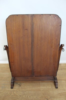 Lot 84 - Mahogany swing frame toilet mirror.