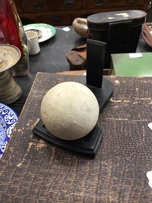 Lot 198 - Unusual curio - a quartz sphere painted with luminescent paint, on a wooden stand