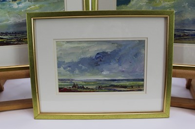 Lot 1004 - *Tom Keating (1917-1984) three oils on board - Extensive Landscapes, signed, 12cm x 20cm, each in glazed gilt frame