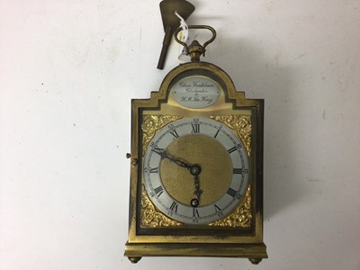 Lot 2414 - Charles Frodsham mantel clock in brass case with original key, together with another smaller example (2)