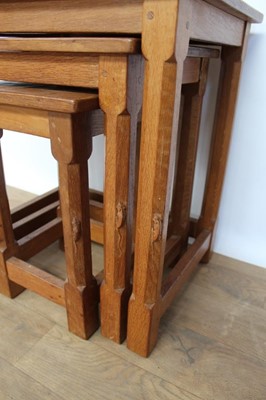 Lot 1327 - Nest of three Robert 'Mouseman' Thompson adzed oak tables