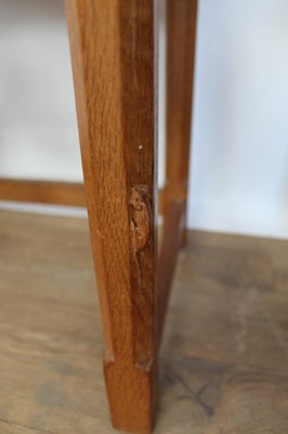 Lot 1327 - Nest of three Robert 'Mouseman' Thompson adzed oak tables