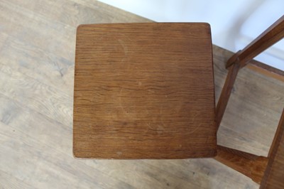 Lot 1327 - Nest of three Robert 'Mouseman' Thompson adzed oak tables