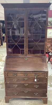 Lot 1352 - George III mahogany bureau bookcase