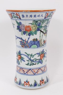 Lot 943 - Chinese Gu vase, decorated in the Wucai style with bands of birds and flowers, six-character Wanli mark around rim, 24cm high
