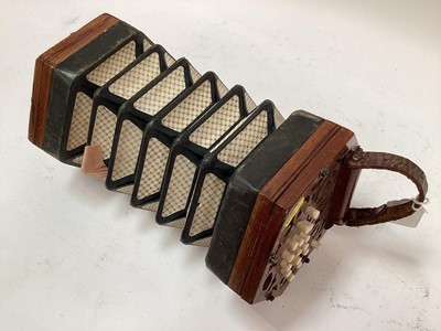 Lot 2200 - Victorian concertina by Butler of Haymarket, London, with fretwork ends and ivory buttons