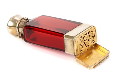 Lot 419 - Victorian silver mounted ruby glass combination vinaigrette and scent bottle