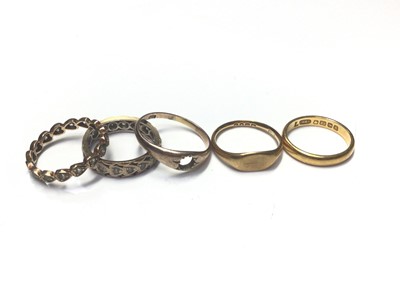 Lot 21 - 22ct gold wedding ring, two 18ct gold rings and two 9ct gold eternity rings (5)