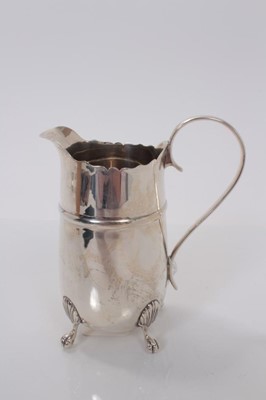 Lot 41 - George V silver milk, raised on four claw and ball feet, (Birmingham 1910), maker J Sherwood & Sons, 14cm in overall height, all at 6ozs