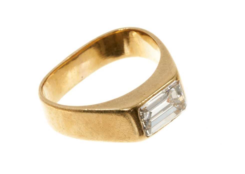 Lot 441 - Diamond single stone ring with a rectangular emerald cut diamond in 18ct yellow gold setting
