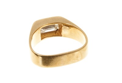 Lot 441 - Diamond single stone ring with a rectangular emerald cut diamond in 18ct yellow gold setting