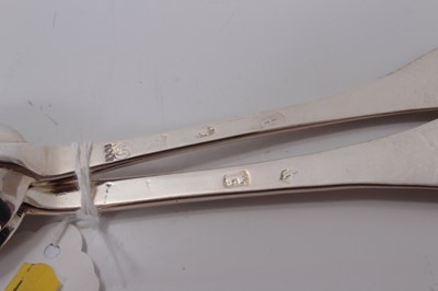 Lot 136 - Pair of early 18th century Britannia silver spoons with later embossed and engraved decoration, marks for London circa 1700, 19.3cm in overall length.(2)