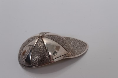 Lot 68 - George IV silver jockey cap caddy spoon with quartered engraved decoration, London 1821- no maker, 7 cm