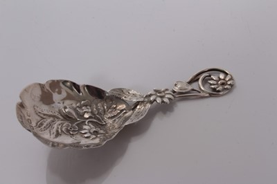 Lot 545 - Victorian silver caddy spoon with embossed floral bowl and pierced floral handle, Birmingham 1866, Hilliard & Thomason 9cm