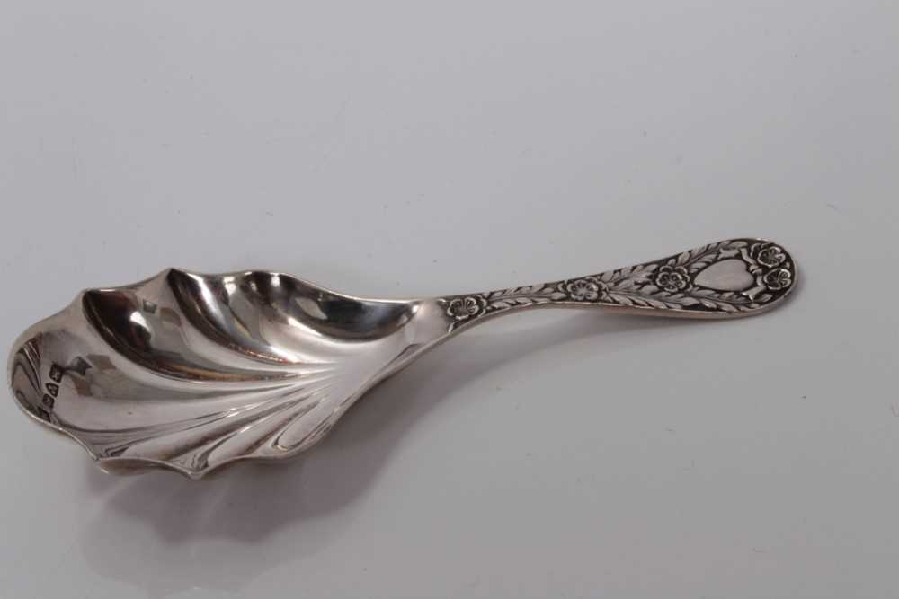 Lot 86 - Edwardian silver shell bowl caddy spoon with cast floral leaf handle, Chester 1905, M.Friedlander & Co.