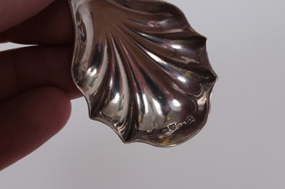 Lot 86 - Edwardian silver shell bowl caddy spoon with cast floral leaf handle, Chester 1905, M.Friedlander & Co.