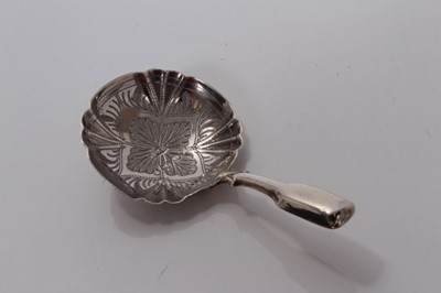 Lot 98 - Victorian silver circular bowl caddy spoon with engraved decoration, Birmingham 1864, Hilliard & Thomason 7cm