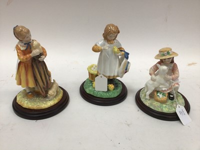 Lot 1077 - Three Royal Doulton limited edition figures - Puppy Love HN3371, Making Friends HN3372 and Feeding Time HN3373