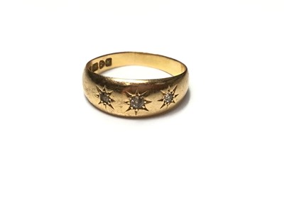 Lot 47 - Edwardian 18ct gold diamond three stone ring in gypsy setting