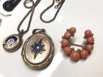 Lot 23 - Victorian coral and seed pearl horseshoe shaped brooch, two antique mourning lockets with enamel decoration and a small selection of jet earrings