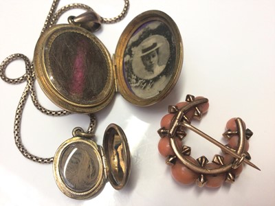 Lot 23 - Victorian coral and seed pearl horseshoe shaped brooch, two antique mourning lockets with enamel decoration and a small selection of jet earrings