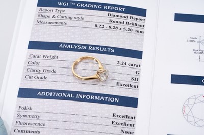 Lot 436 - Diamond single stone ring with a round brilliant cut diamond weighing approximately 2.24cts in six claw setting on 18ct yellow gold shank, accompanied by a gemological report by World Gemological I...