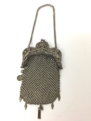 Lot 125 - Art Nouveau silver mesh purse with green man and cherub decoration