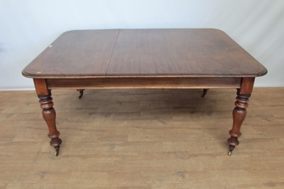 Lot 1342 - Victorian mahogany extending dining table with one extra leaf on turned legs, 160cm x 115cm