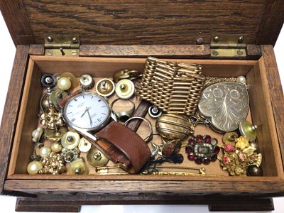 Lot 58 - Georgian garnet and seed pearl brooch, Victorian yellow metal oval locket on chain, Edwardian gilt metal gate bracelet and costume jewellery